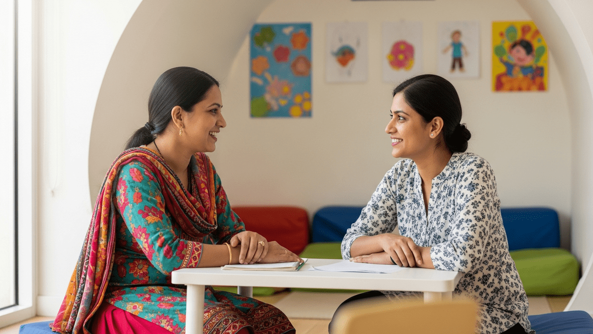 Indian mother discussing child progress at home learning POD India with teacher